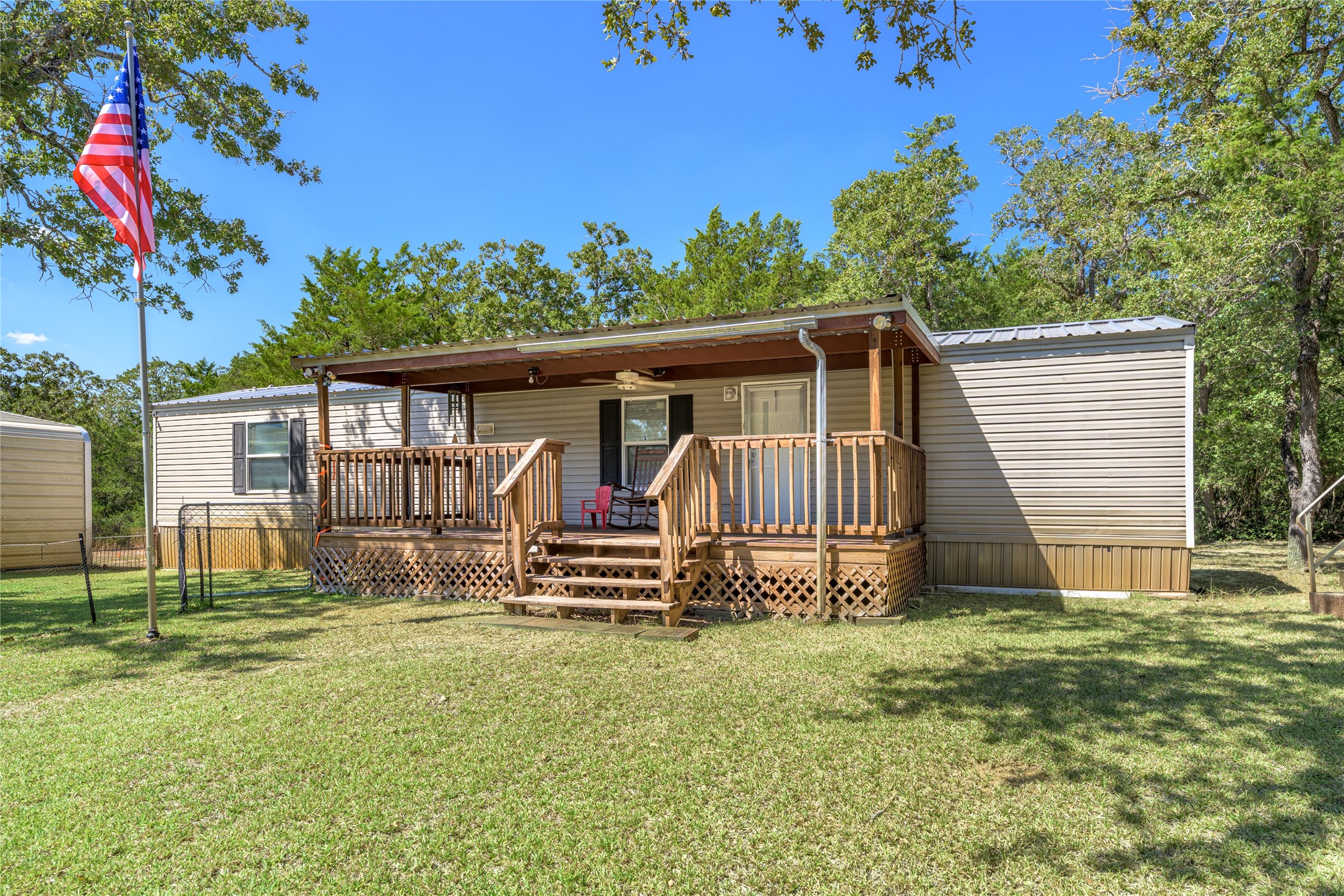 3940 Davis Road West Point, TX 78963 - Photo 2 of 22 a front view of a house with garden