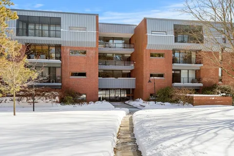 a front view of a building with street view