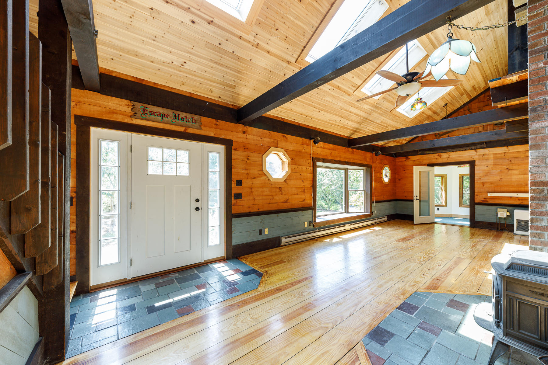 26 Pine Ridge Road East Falmouth, MA 02536 - Photo 11 of 36 a view of a room with wooden floor and windows