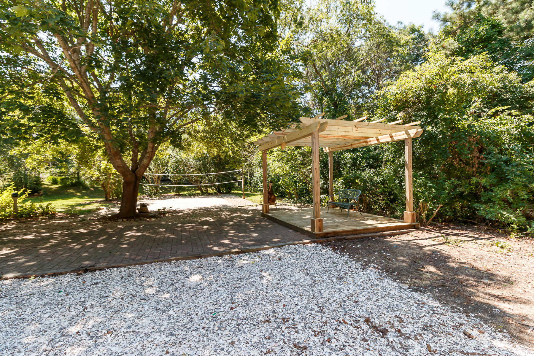 26 Pine Ridge Road East Falmouth, MA 02536 - Photo 32 of 36 a view of outdoor space with deck and tree