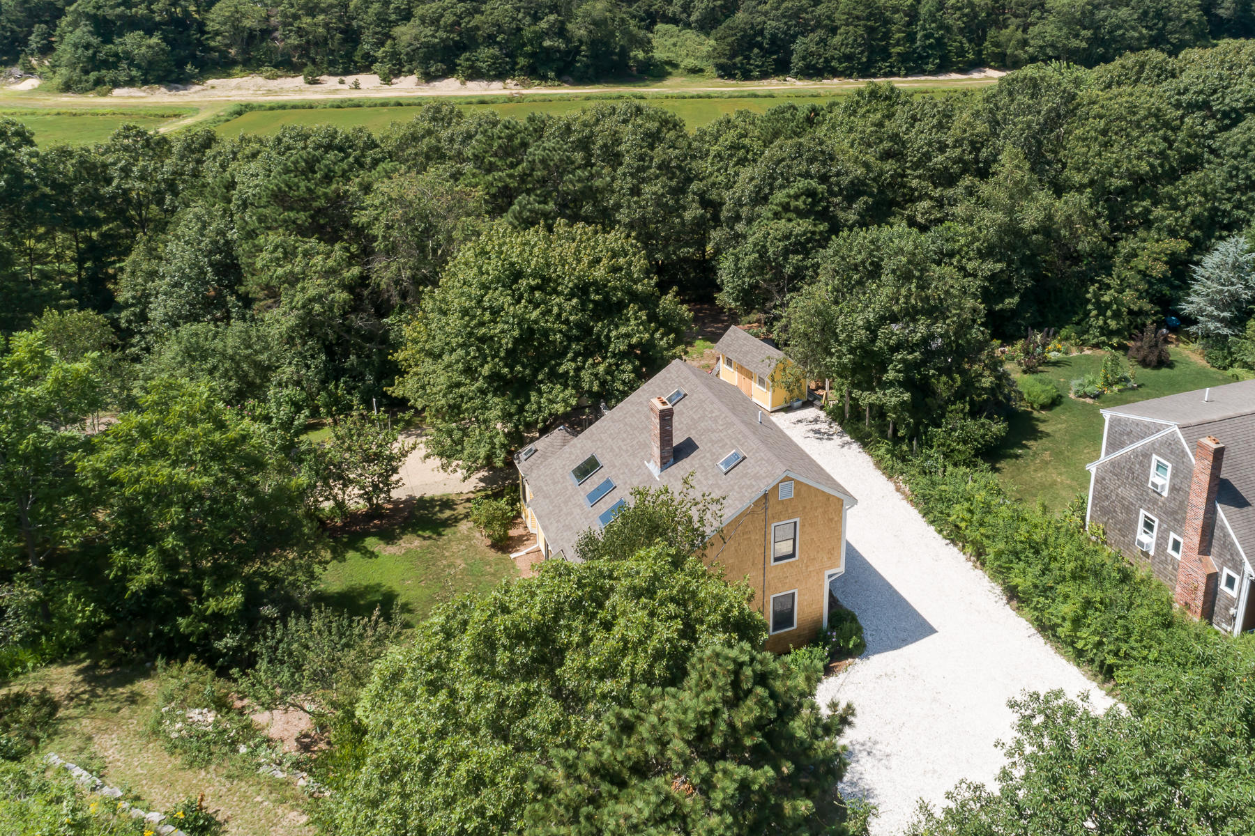 26 Pine Ridge Road East Falmouth, MA 02536 - Photo 35 of 36 an aerial view of a house with a yard and lake view