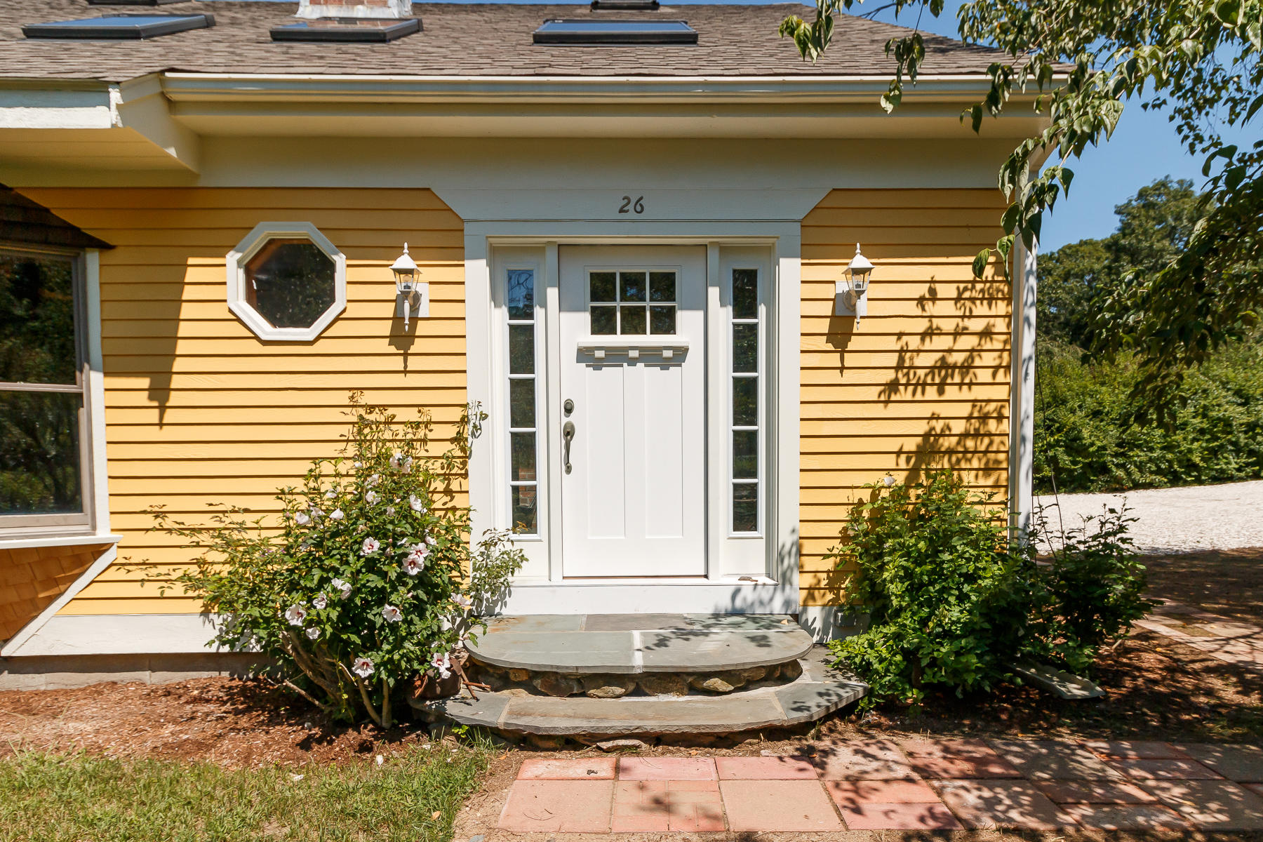 26 Pine Ridge Road East Falmouth, MA 02536 - Photo 4 of 36 a front view of a house with plants