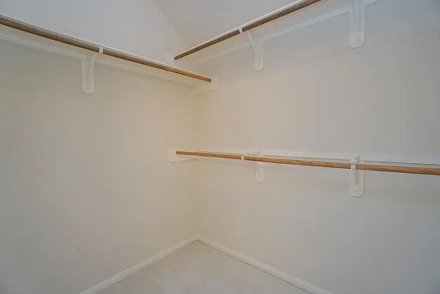 a view of a room with racks on the wall