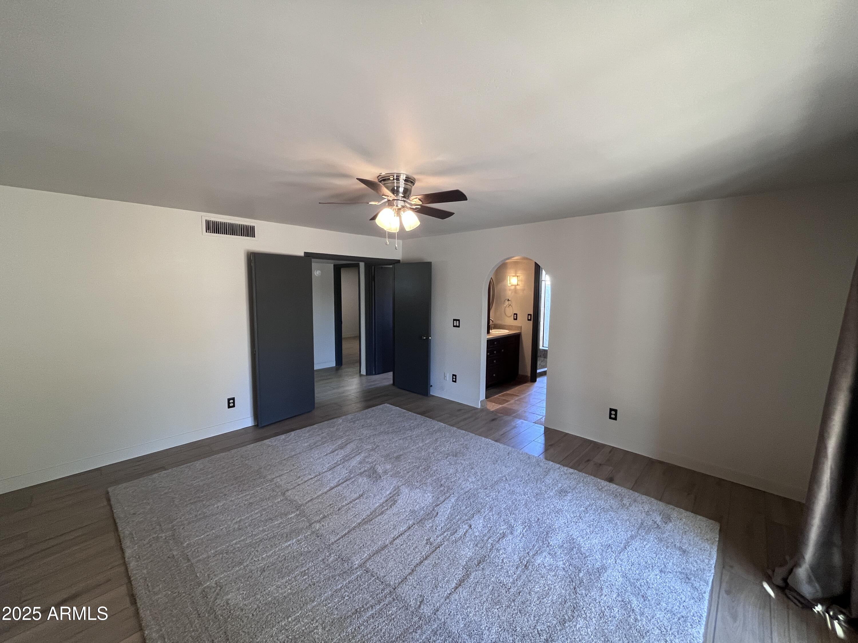 2129 East Huntington Drive Tempe, AZ 85282 - Photo 13 of 36 wooden floor in an empty room