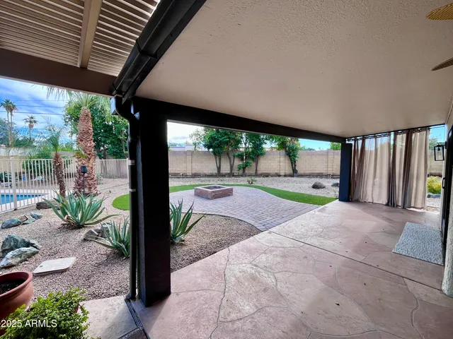 a view of a porch with a garden