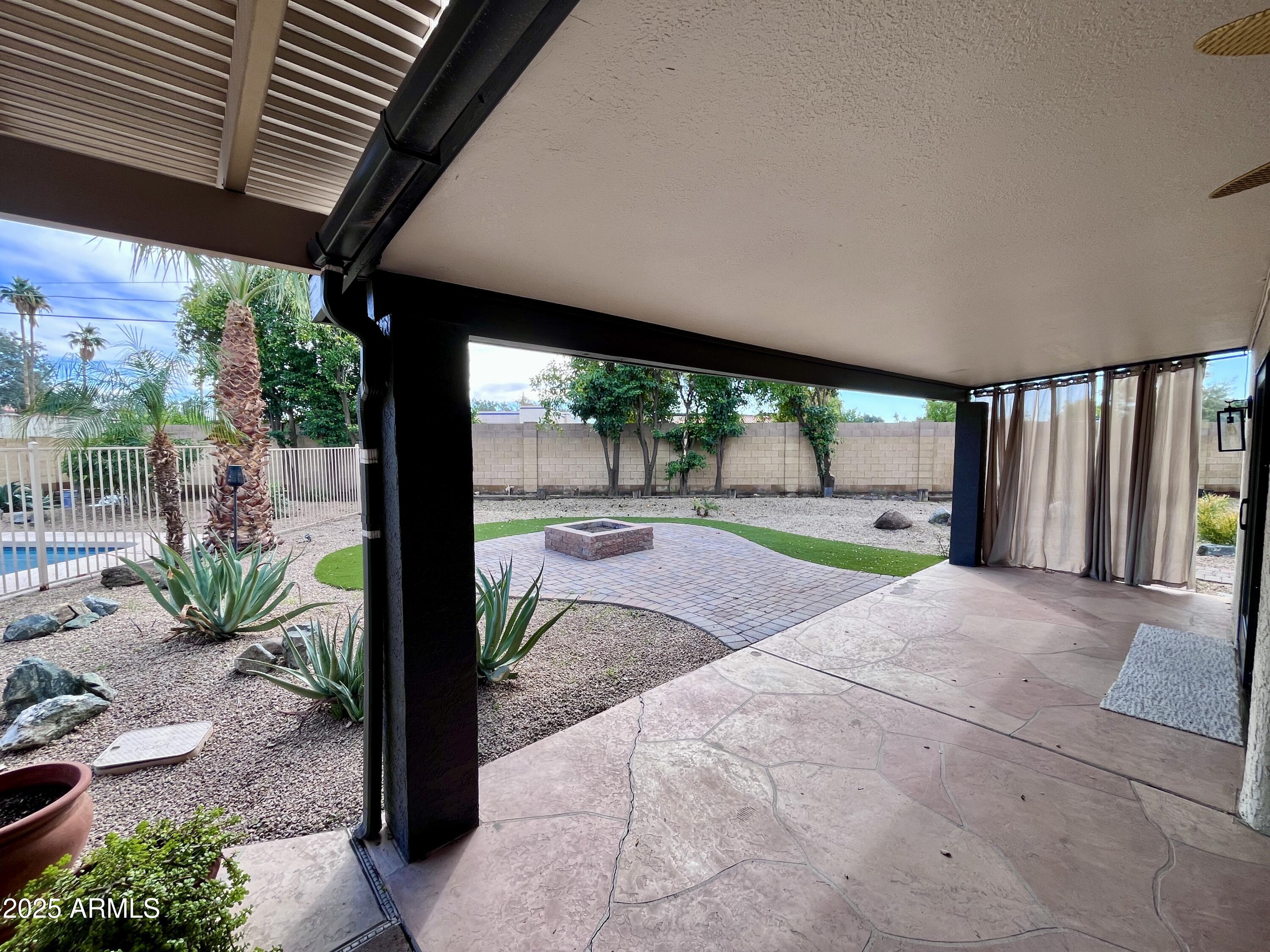2129 East Huntington Drive Tempe, AZ 85282 - Photo 25 of 36 a view of a porch with a garden