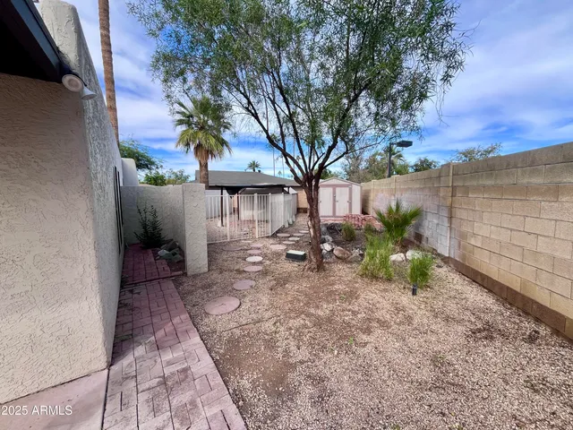 a view of a backyard with a garden