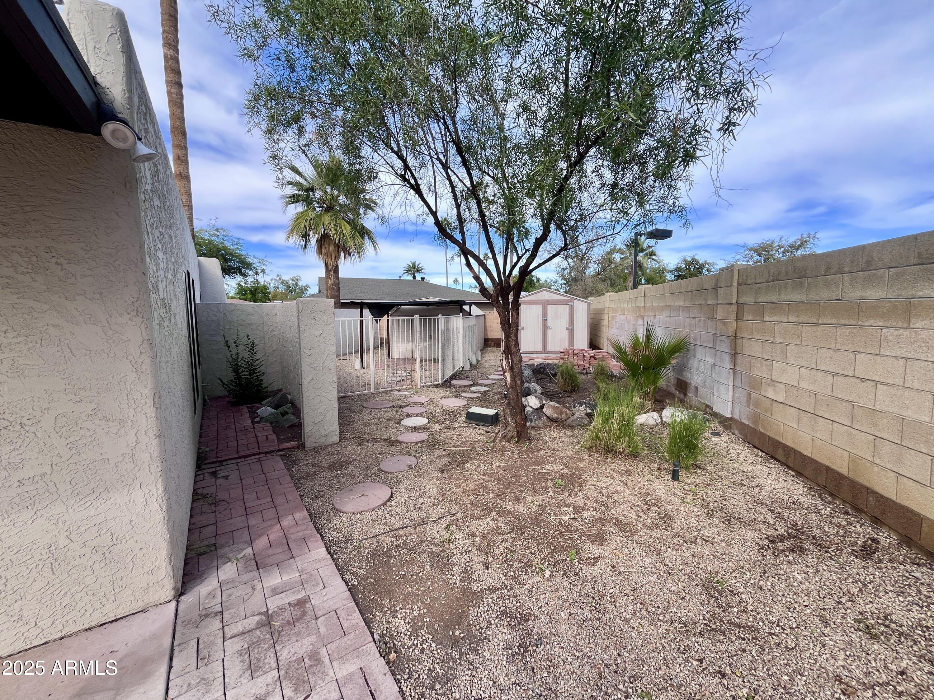 2129 East Huntington Drive Tempe, AZ 85282 - Photo 32 of 36 a view of a backyard with a garden