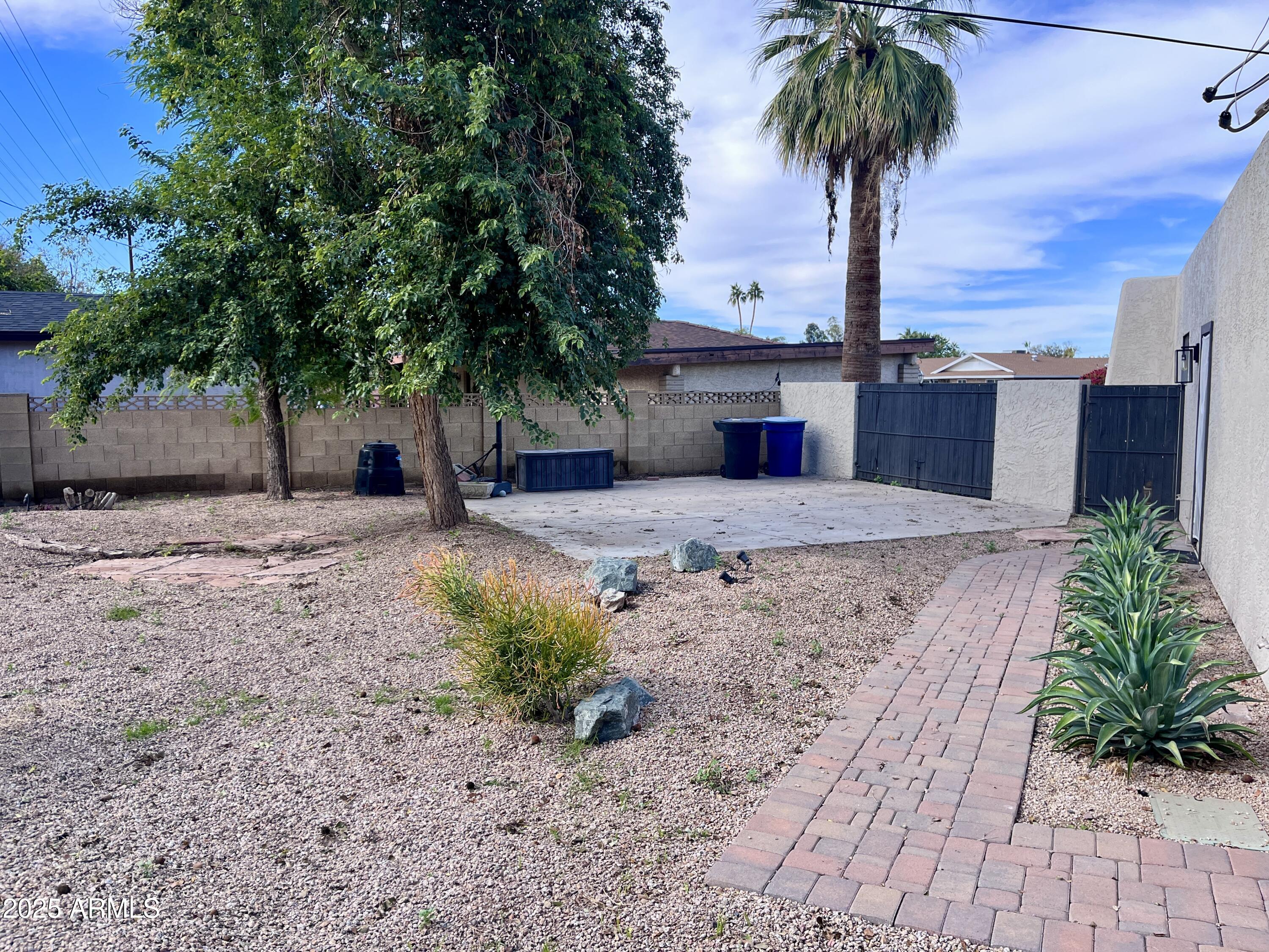2129 East Huntington Drive Tempe, AZ 85282 - Photo 34 of 36 a view of a backyard with a tree