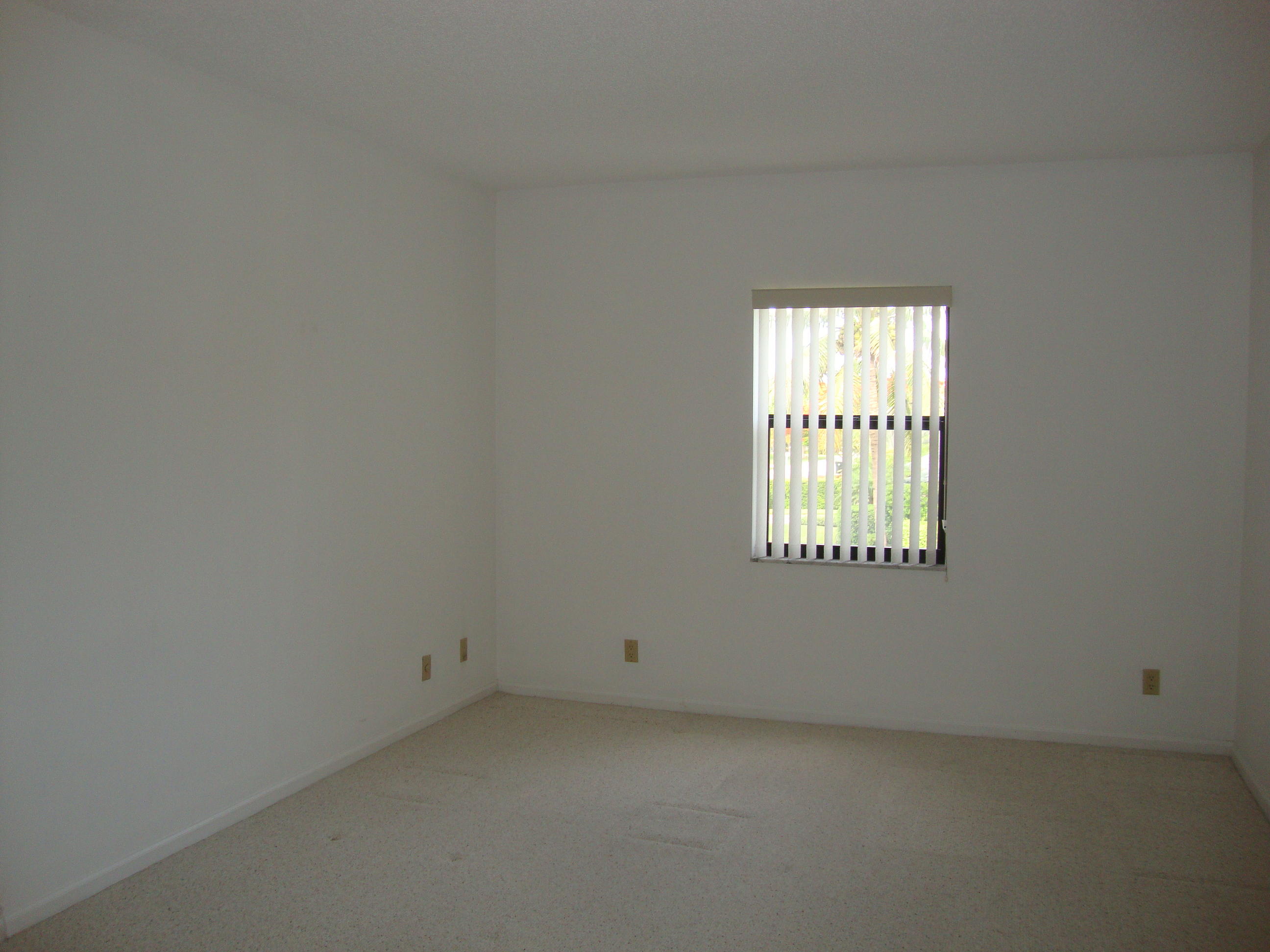 2679 South Ocean Boulevard, Unit 2B Boca Raton, FL 33432 - Photo 20 of 42 a view of an empty room with a window