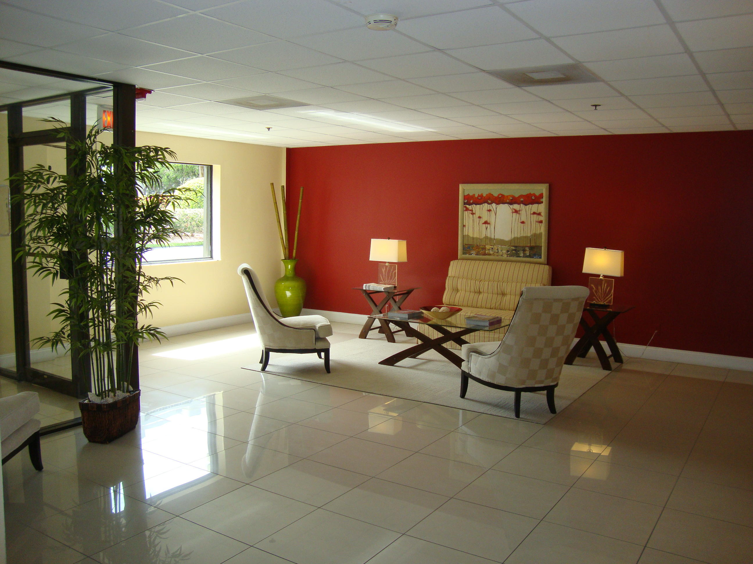 2679 South Ocean Boulevard, Unit 2B Boca Raton, FL 33432 - Photo 33 of 42 a living room with furniture and a potted plant