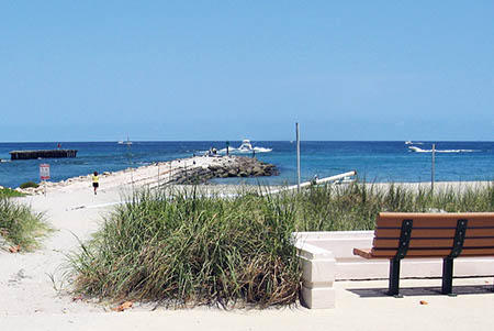 2679 South Ocean Boulevard, Unit 2B Boca Raton, FL 33432 - Photo 41 of 42 a view of a terrace with a bench