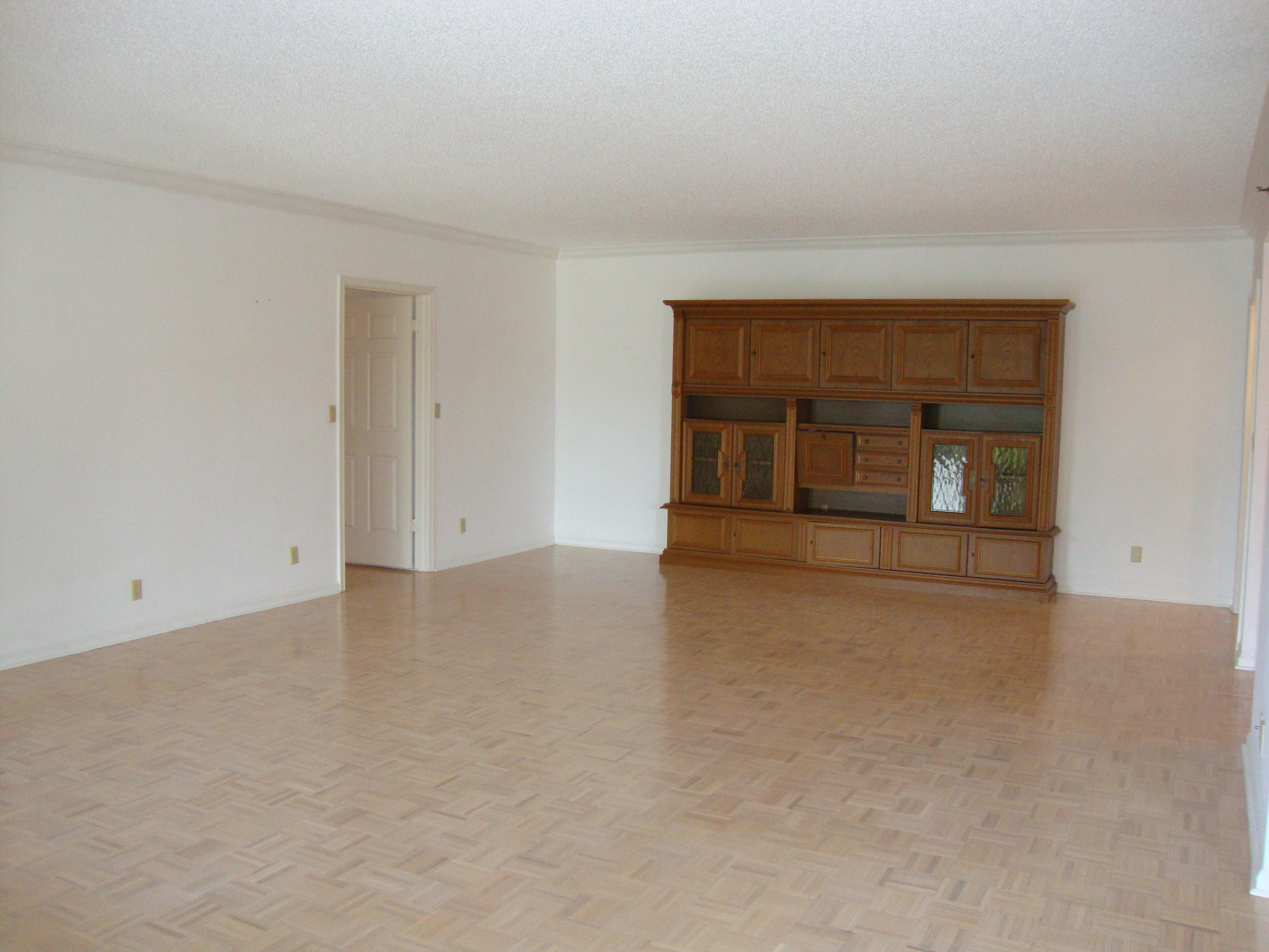 2679 South Ocean Boulevard, Unit 2B Boca Raton, FL 33432 - Photo 5 of 42 a view of an empty room with a window