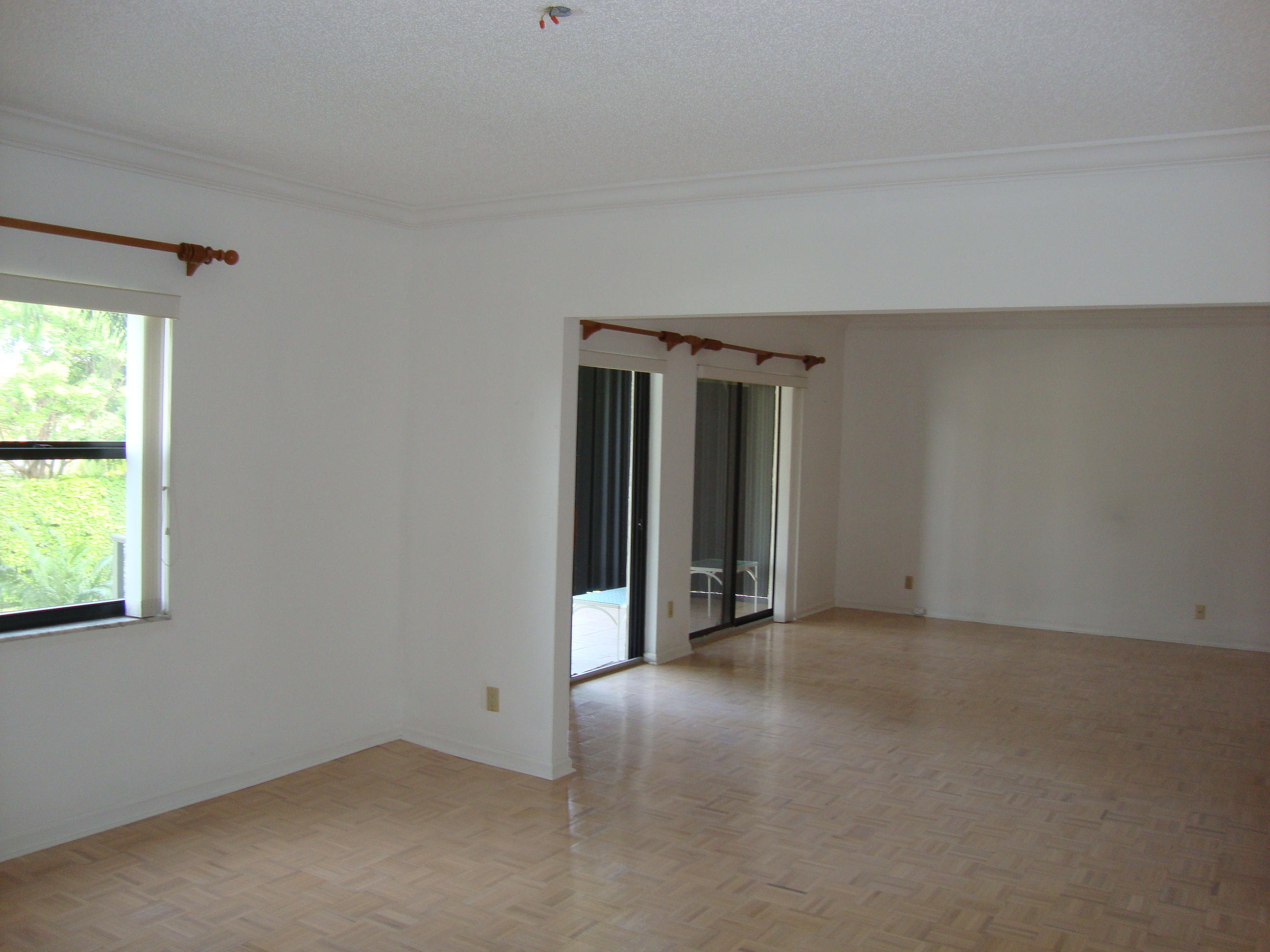 2679 South Ocean Boulevard, Unit 2B Boca Raton, FL 33432 - Photo 7 of 42 an empty room with closet