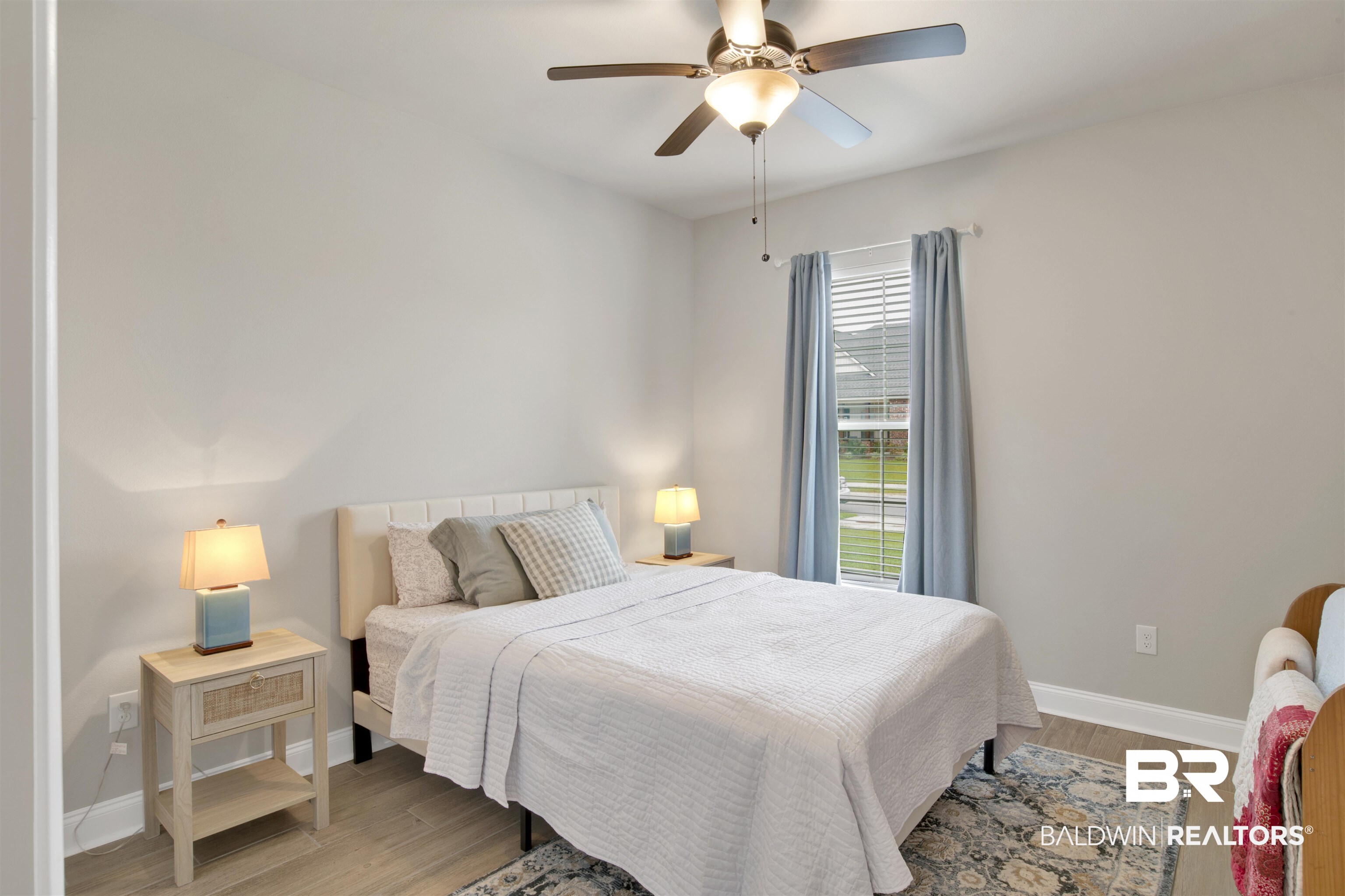 30770 Marcel Boulevard Spanish Fort, AL 36527 - Photo 18 of 23 Bedroom featuring wood-type flooring and ceiling fan