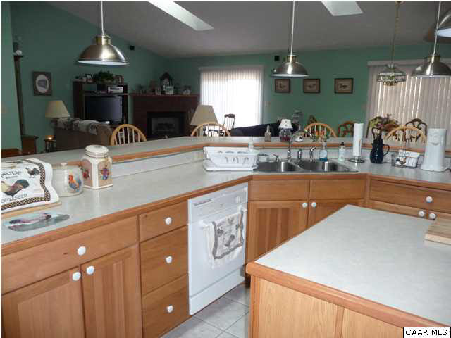 3611 Union Mills Road Troy, VA 22974 - Photo 6 of 31 Kitchen cabinets and island of great room