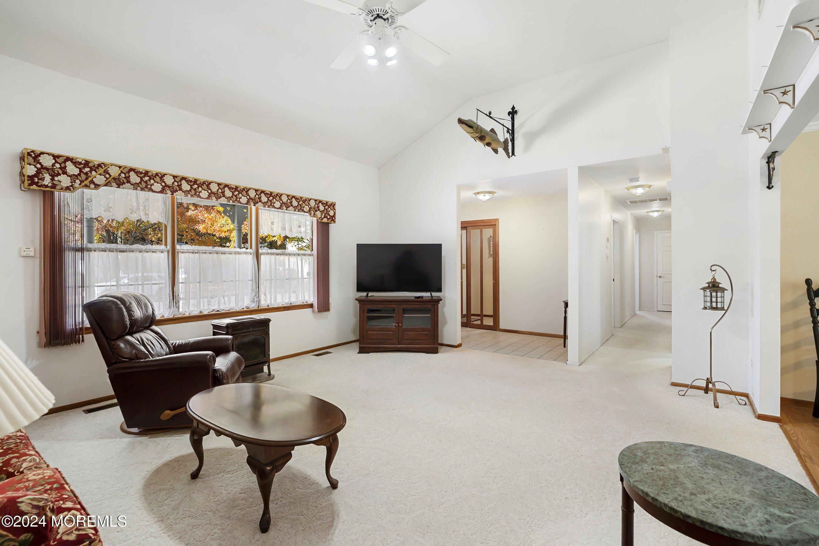 305 Bayside E Parkway Forked River, NJ 08731 - Photo 13 of 39 a living room with furniture and a flat screen tv