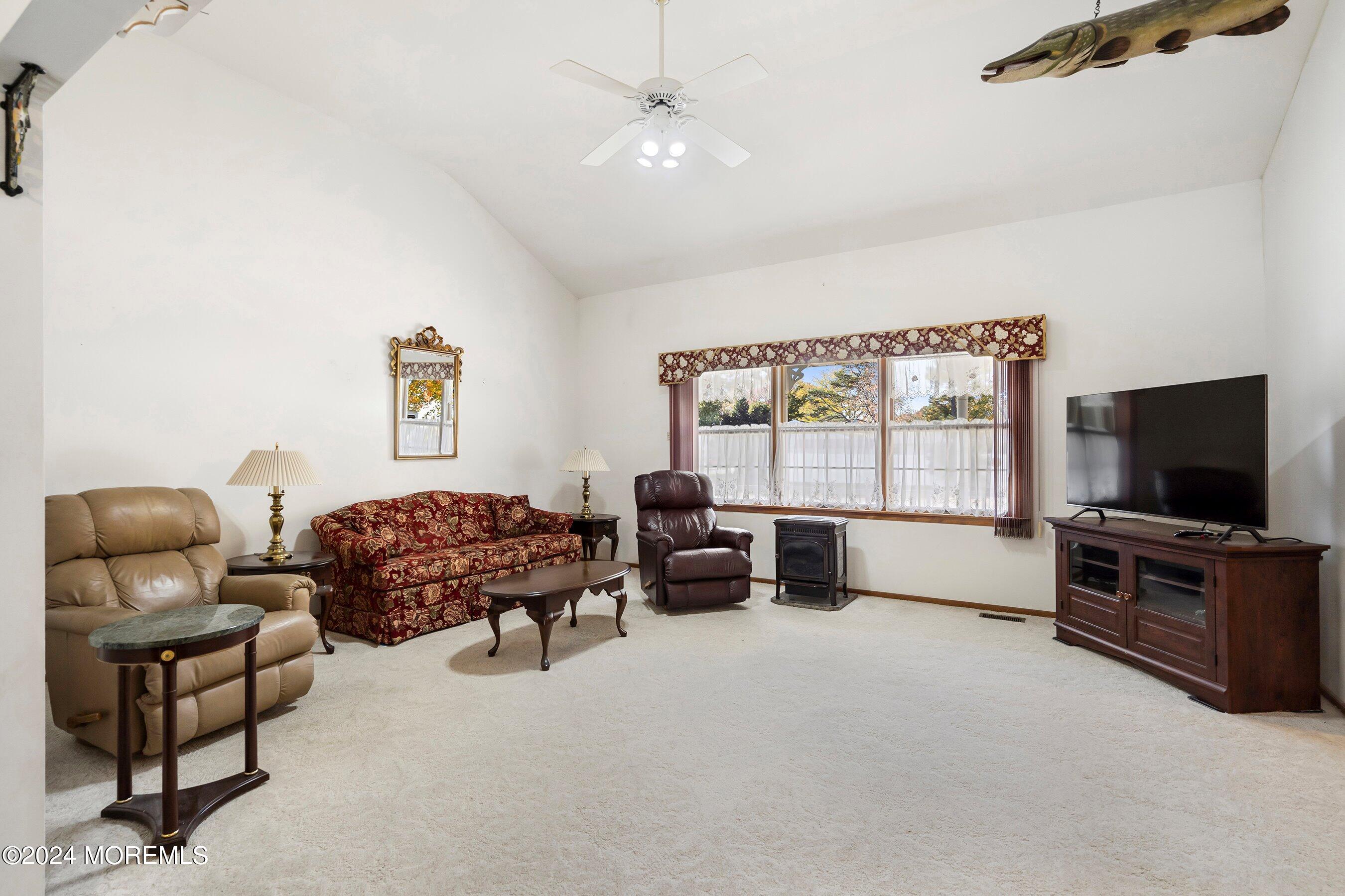 305 Bayside E Parkway Forked River, NJ 08731 - Photo 14 of 39 a bedroom with furniture and a flat screen tv
