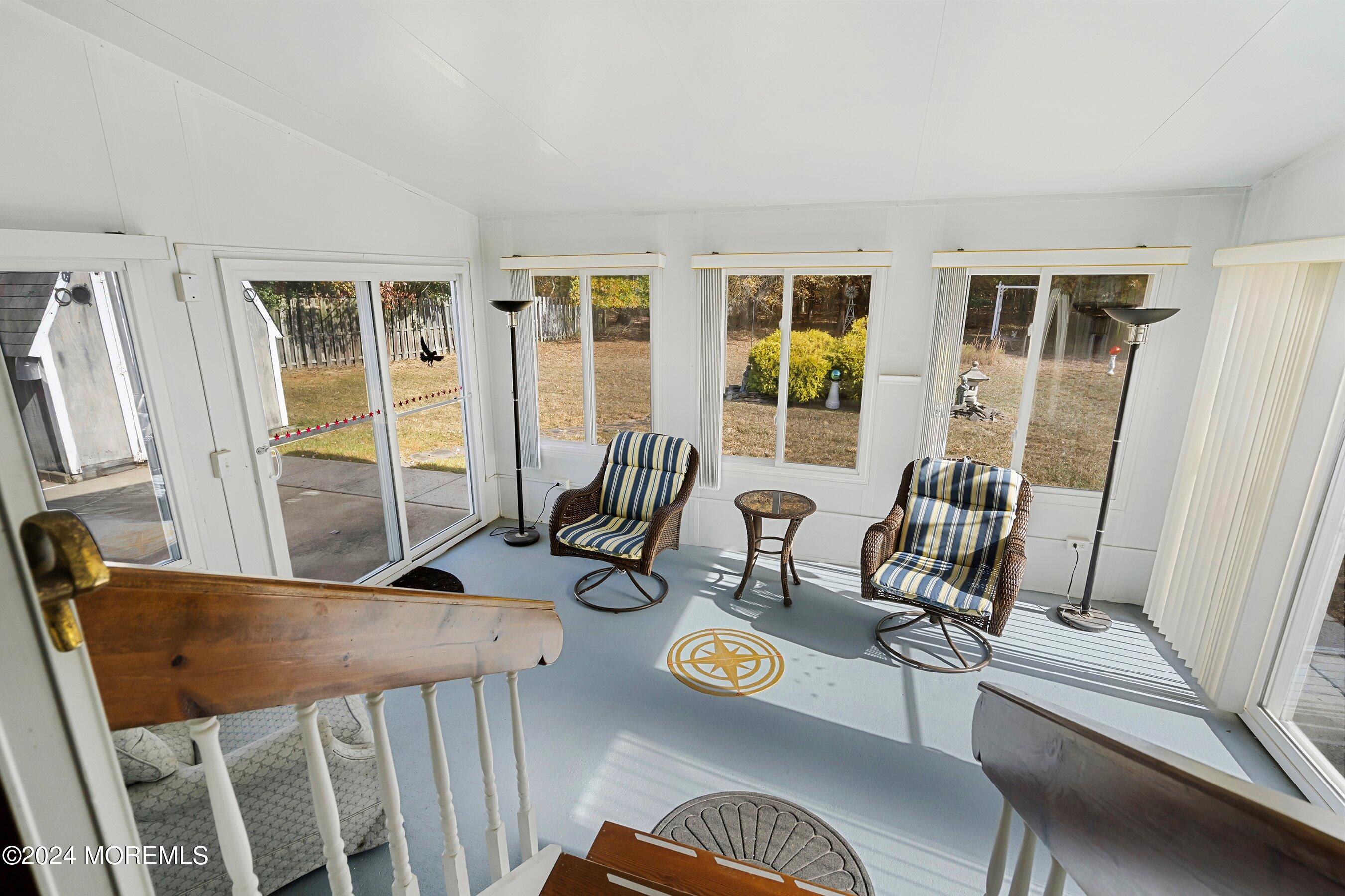 305 Bayside E Parkway Forked River, NJ 08731 - Photo 22 of 39 a living room with furniture and a table