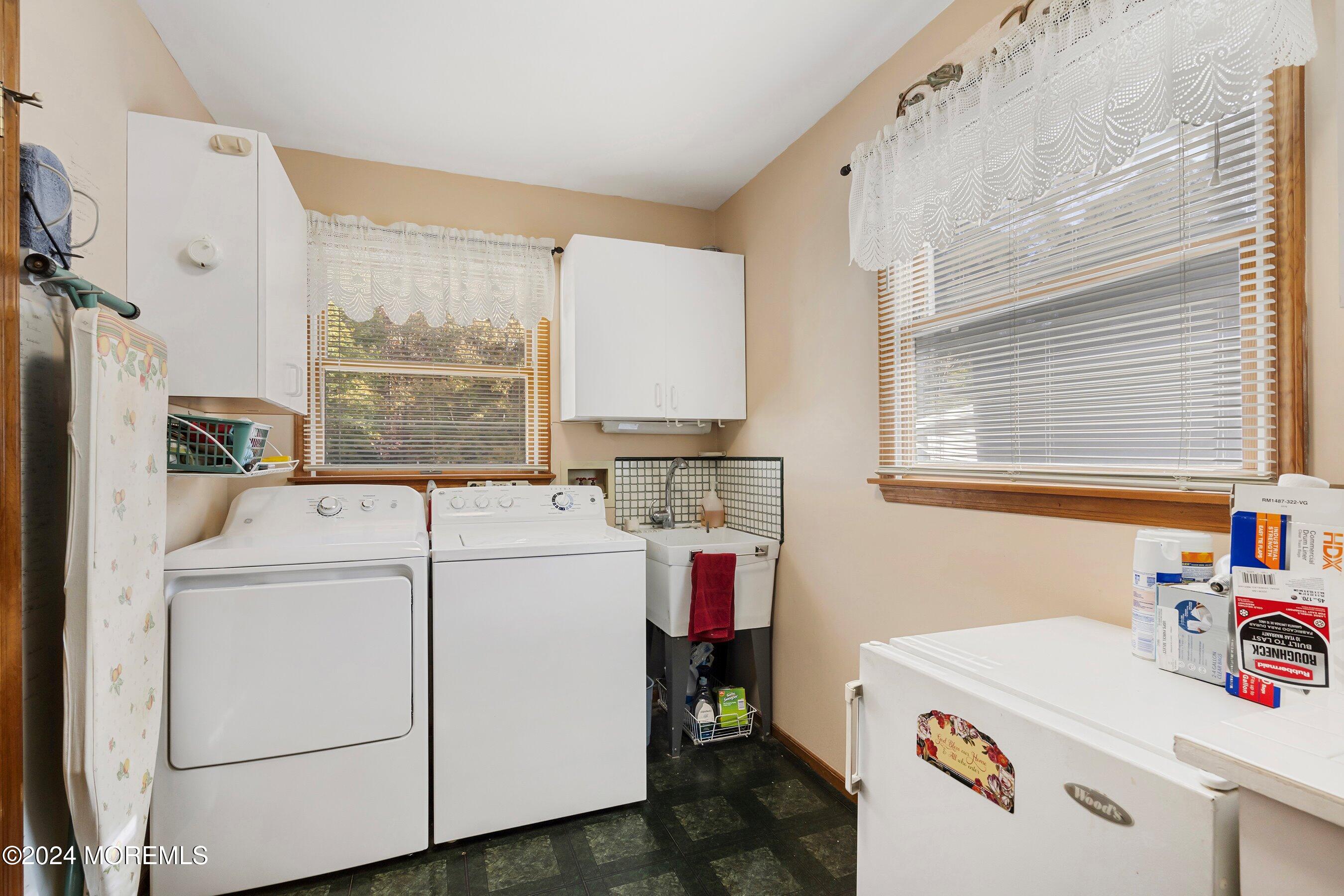 305 Bayside E Parkway Forked River, NJ 08731 - Photo 24 of 39 a utility room with dryer and washer