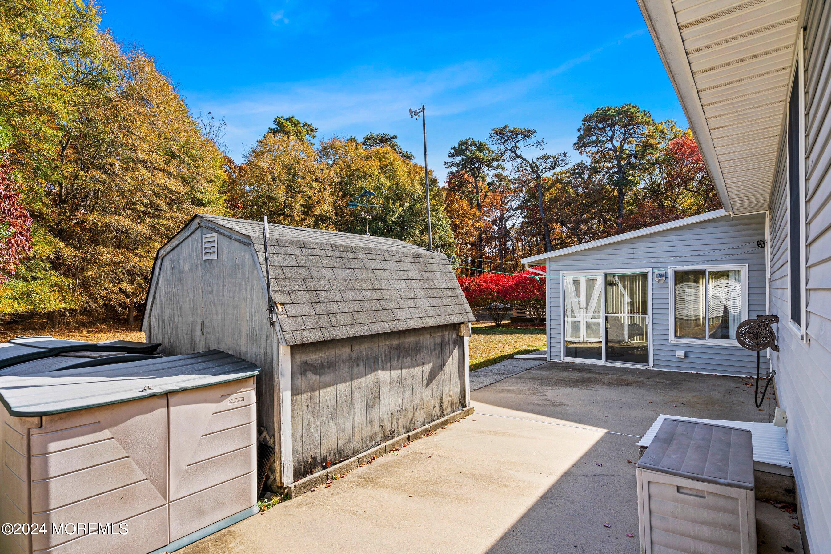 305 Bayside E Parkway Forked River, NJ 08731 - Photo 34 of 39 a front view of a house with garden