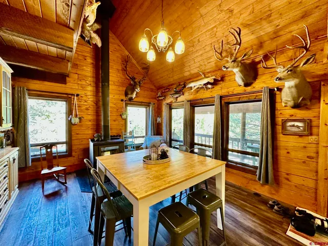 a view of a chairs and table in a patio