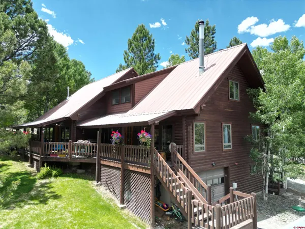 a view of porch with a yard