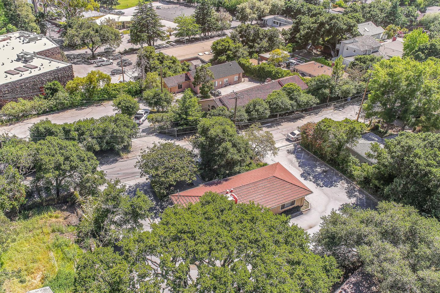 1513 Folger Drive Belmont, CA 94002 - Photo 13 of 18 an aerial view of residential houses with outdoor space and trees all around
