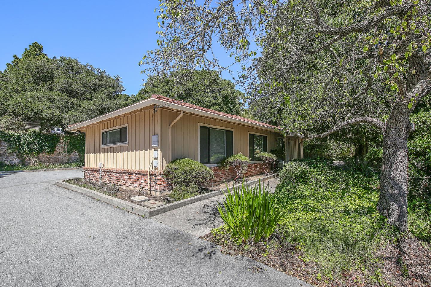 1513 Folger Drive Belmont, CA 94002 - Photo 4 of 18 a view of a house with a yard and potted plants