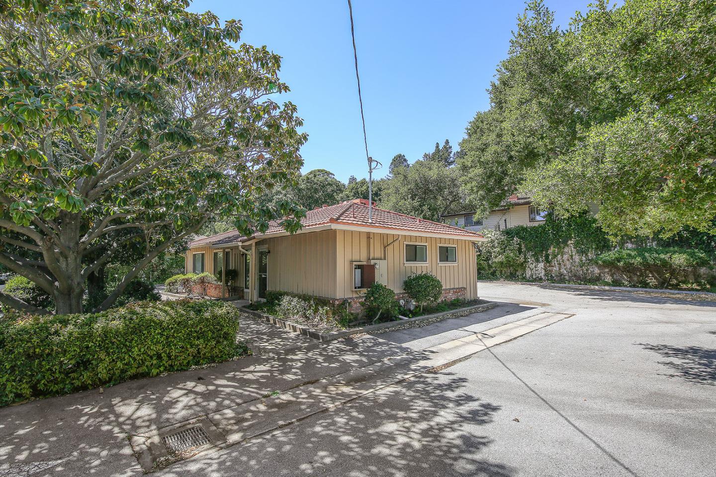 1513 Folger Drive Belmont, CA 94002 - Photo 6 of 18 a front view of a house with garden