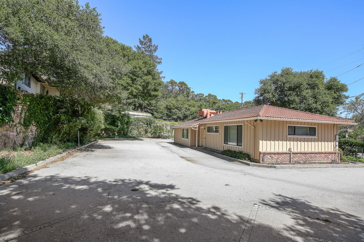 1513 Folger Drive Belmont, CA 94002 - Photo 7 of 18 a front view of a house with a garden