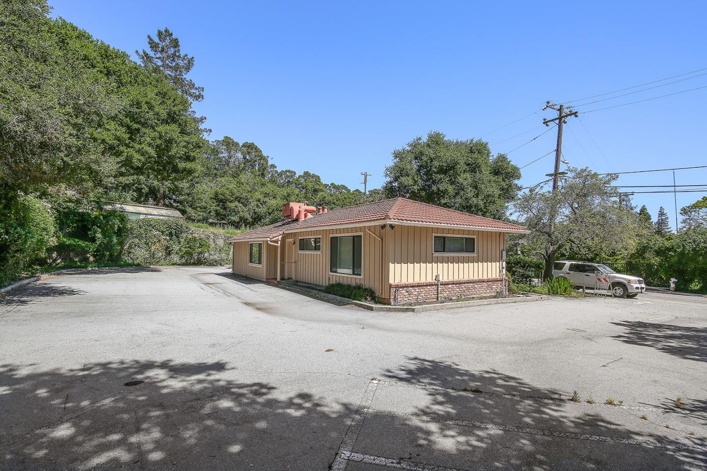 1513 Folger Drive Belmont, CA 94002 - Photo 8 of 18 a house with trees in the background