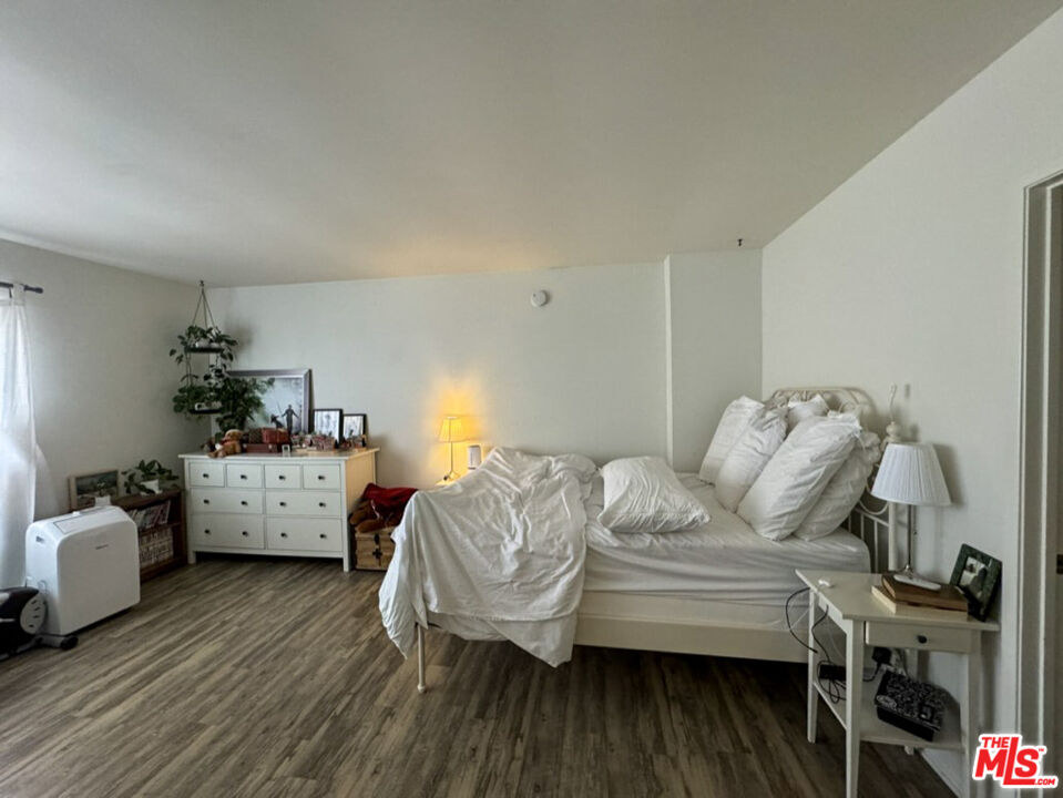12511 Culver Boulevard Los Angeles, CA 90066 - Photo 21 of 26 a living room with furniture and wooden floor