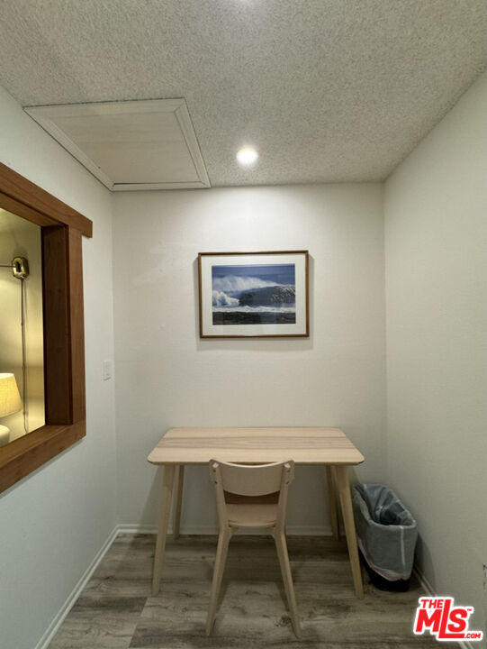 12511 Culver Boulevard Los Angeles, CA 90066 - Photo 4 of 26 a workspace with furniture and window