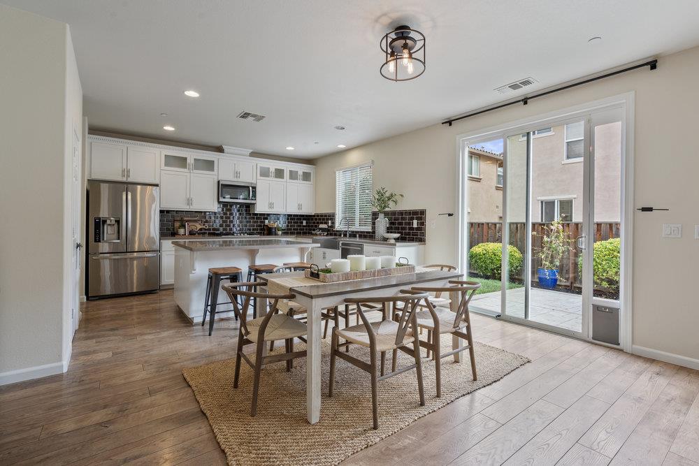 130 Lusitano Way Gilroy, CA 95020 - Photo 14 of 50 a view of a dining area with furniture