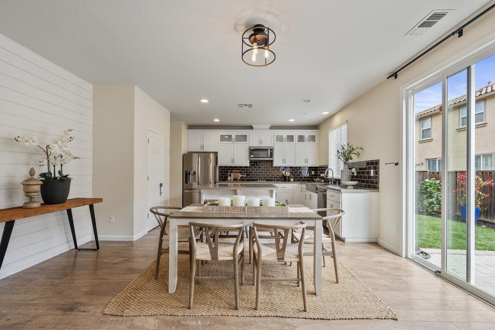 130 Lusitano Way Gilroy, CA 95020 - Photo 15 of 50 a view of a dining room with furniture window and outside view