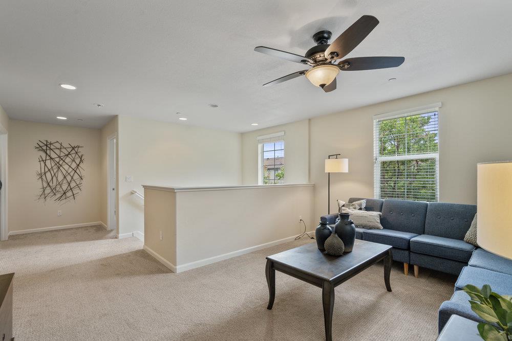 130 Lusitano Way Gilroy, CA 95020 - Photo 31 of 50 a living room with furniture and a window