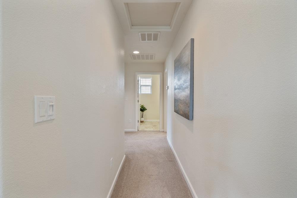 130 Lusitano Way Gilroy, CA 95020 - Photo 32 of 50 a view of a hallway