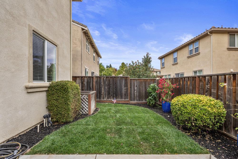 130 Lusitano Way Gilroy, CA 95020 - Photo 38 of 50 a view of a backyard with a garden
