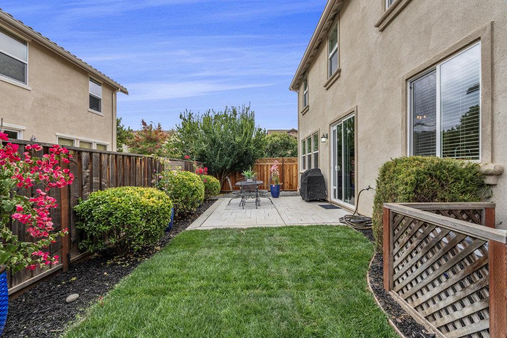 130 Lusitano Way Gilroy, CA 95020 - Photo 40 of 50 a view of a patio with a chairs and table in a patio