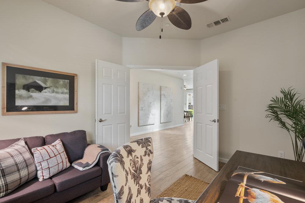 130 Lusitano Way Gilroy, CA 95020 - Photo 8 of 50 a living room with furniture and a potted plant