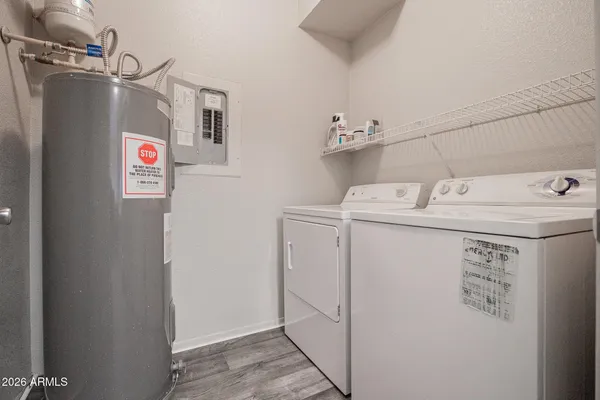 a utility room with dryer and washer
