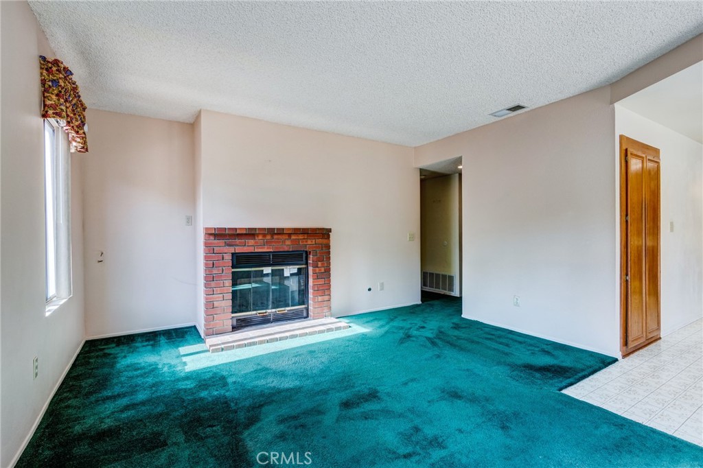1922 Alta Street Redlands, CA 92374 - Photo 13 of 45 a view of an empty room with window