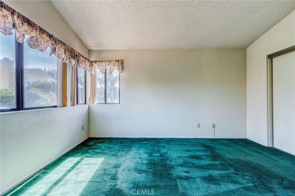 1922 Alta Street Redlands, CA 92374 - Photo 20 of 45 a view of an empty room with a window