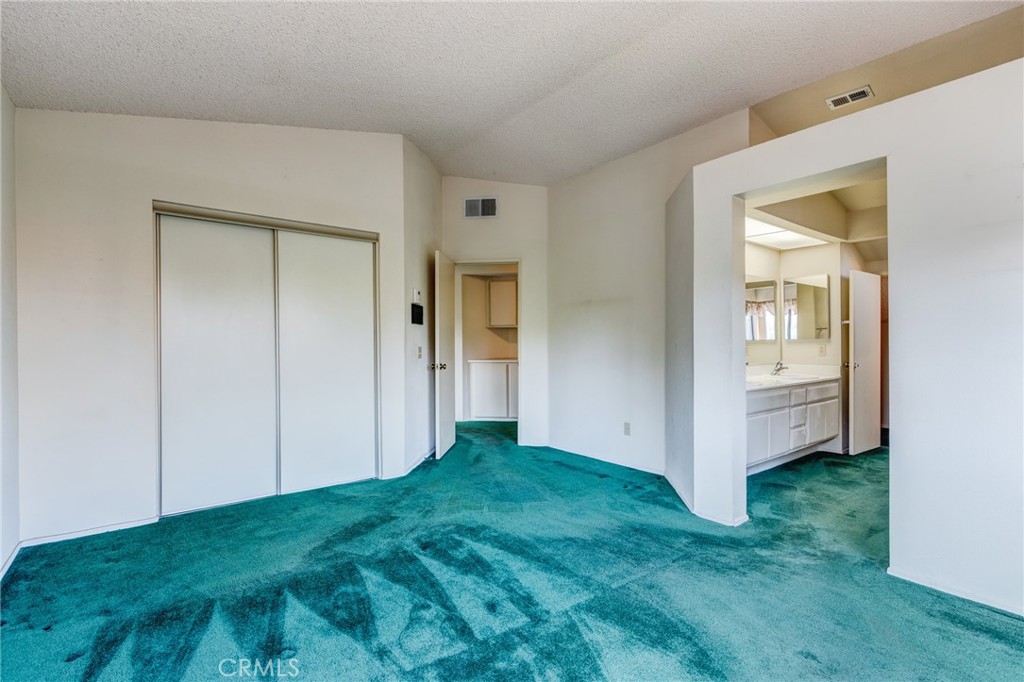 1922 Alta Street Redlands, CA 92374 - Photo 21 of 45 a view of a bedroom from the hallway
