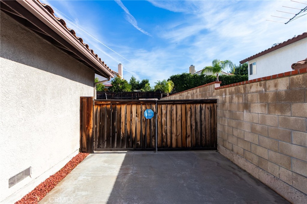 1922 Alta Street Redlands, CA 92374 - Photo 33 of 45 a view of backyard with wooden fence