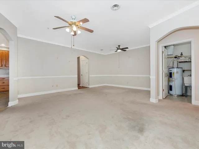 a view of kitchen with wooden floor and window
