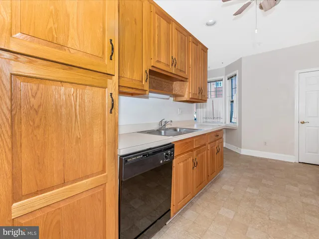 a bathroom with a toilet and a sink