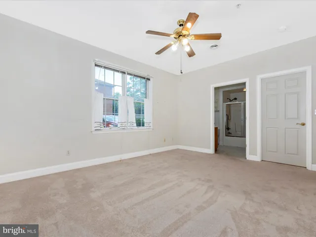 a car parked in front of a house