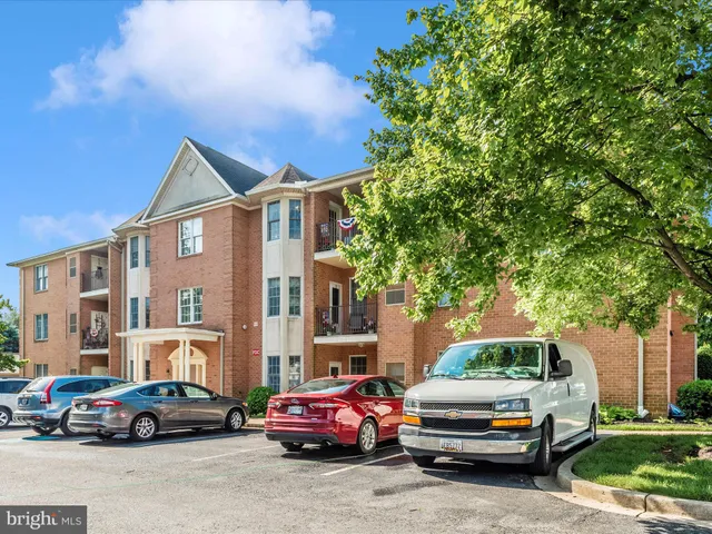 a kitchen with a sink and a stove top oven